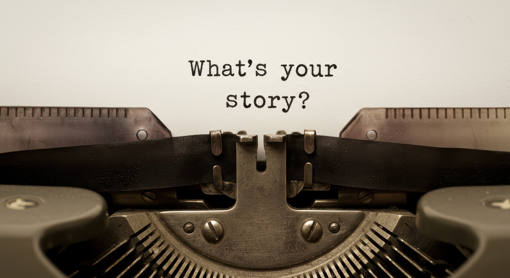 "What's your story" steht auf einem Blatt